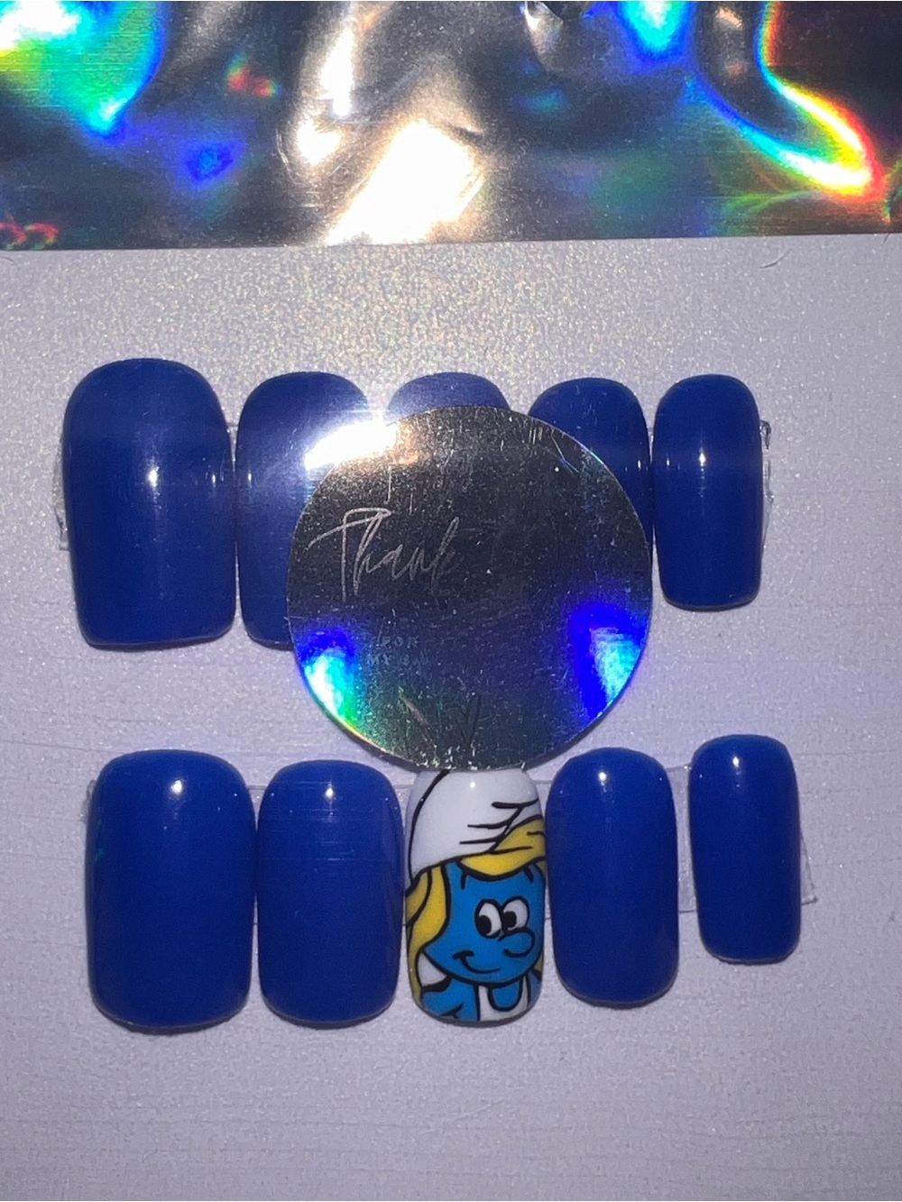 Blue Press-On Nail Set with Cartoon Accent Smurfette nails by Qui